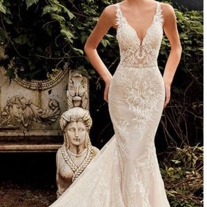 BRAND new NEVER worn designer wedding dress.